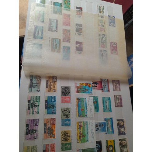 15 - Assorted stamp stock books and loose pages with mint and used QEII era Commonwealth, badly stored wi... 