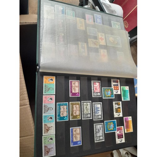 15 - Assorted stamp stock books and loose pages with mint and used QEII era Commonwealth, badly stored wi... 