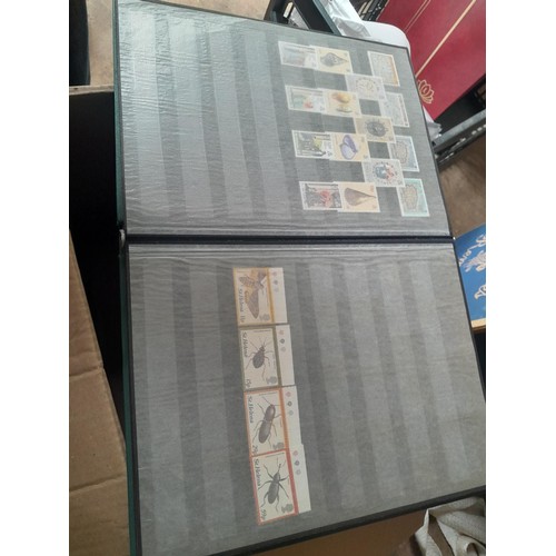 15 - Assorted stamp stock books and loose pages with mint and used QEII era Commonwealth, badly stored wi... 