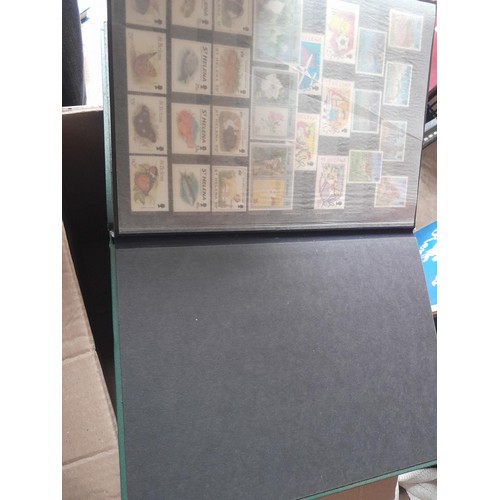 15 - Assorted stamp stock books and loose pages with mint and used QEII era Commonwealth, badly stored wi... 