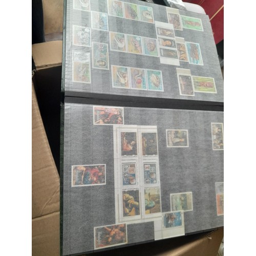 15 - Assorted stamp stock books and loose pages with mint and used QEII era Commonwealth, badly stored wi... 