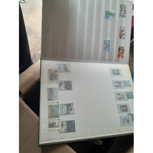 15 - Assorted stamp stock books and loose pages with mint and used QEII era Commonwealth, badly stored wi... 