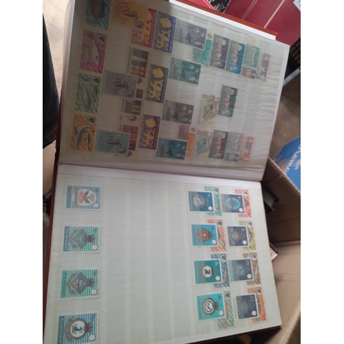 15 - Assorted stamp stock books and loose pages with mint and used QEII era Commonwealth, badly stored wi... 