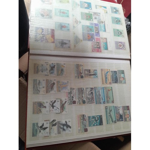 15 - Assorted stamp stock books and loose pages with mint and used QEII era Commonwealth, badly stored wi... 