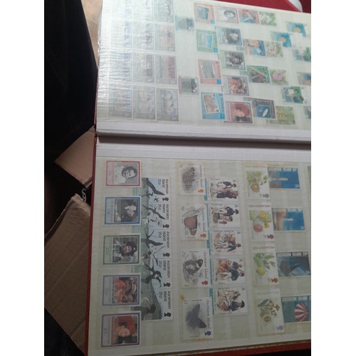 15 - Assorted stamp stock books and loose pages with mint and used QEII era Commonwealth, badly stored wi... 