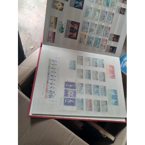 15 - Assorted stamp stock books and loose pages with mint and used QEII era Commonwealth, badly stored wi... 