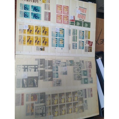 23 - 3 x stock books with a large accumulation of stamps of the Netherlands, a few used but mainly unmoun... 