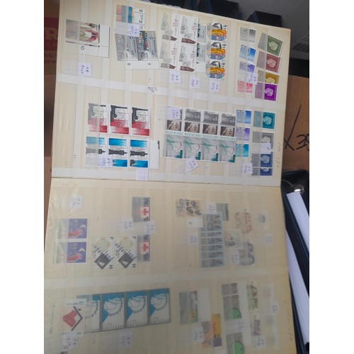 23 - 3 x stock books with a large accumulation of stamps of the Netherlands, a few used but mainly unmoun... 