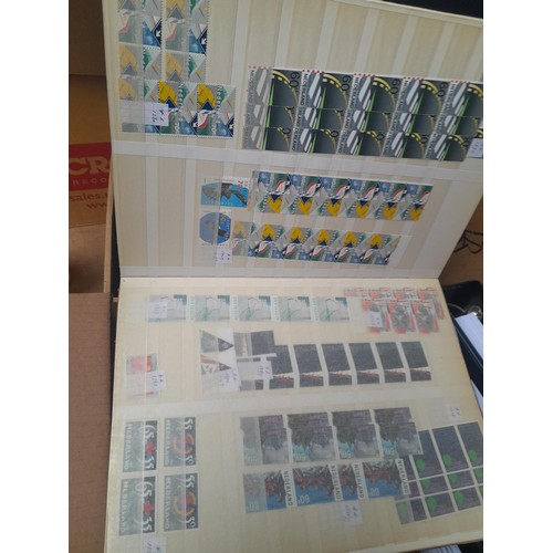 23 - 3 x stock books with a large accumulation of stamps of the Netherlands, a few used but mainly unmoun... 