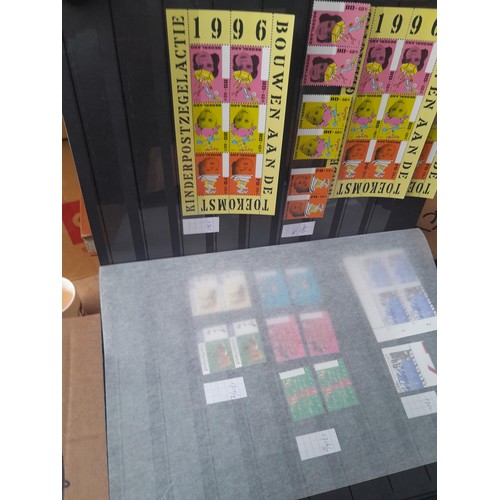 23 - 3 x stock books with a large accumulation of stamps of the Netherlands, a few used but mainly unmoun... 