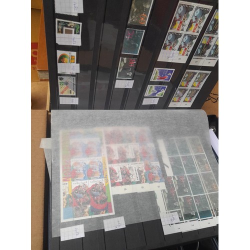 23 - 3 x stock books with a large accumulation of stamps of the Netherlands, a few used but mainly unmoun... 