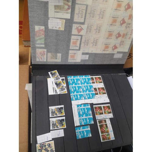 23 - 3 x stock books with a large accumulation of stamps of the Netherlands, a few used but mainly unmoun... 