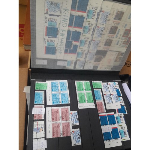 23 - 3 x stock books with a large accumulation of stamps of the Netherlands, a few used but mainly unmoun... 