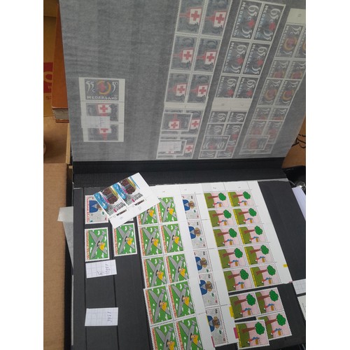 23 - 3 x stock books with a large accumulation of stamps of the Netherlands, a few used but mainly unmoun... 