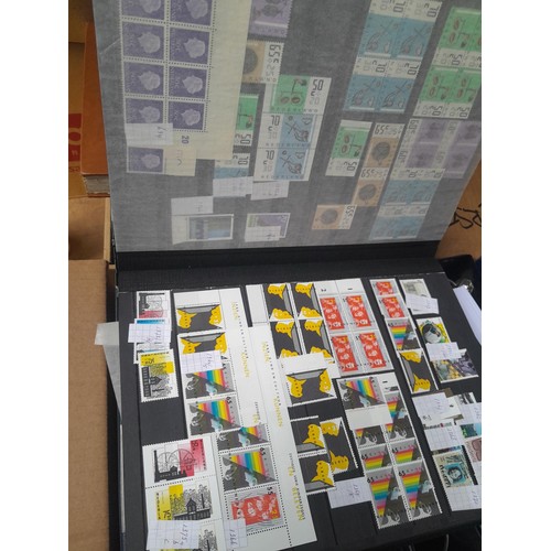 23 - 3 x stock books with a large accumulation of stamps of the Netherlands, a few used but mainly unmoun... 