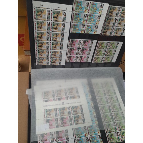 23 - 3 x stock books with a large accumulation of stamps of the Netherlands, a few used but mainly unmoun... 