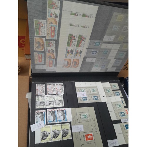 23 - 3 x stock books with a large accumulation of stamps of the Netherlands, a few used but mainly unmoun... 