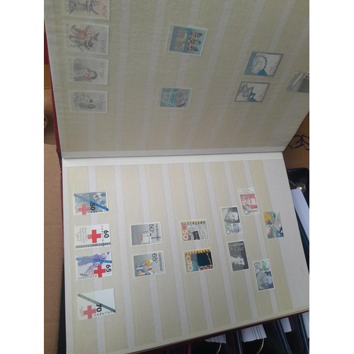 23 - 3 x stock books with a large accumulation of stamps of the Netherlands, a few used but mainly unmoun... 