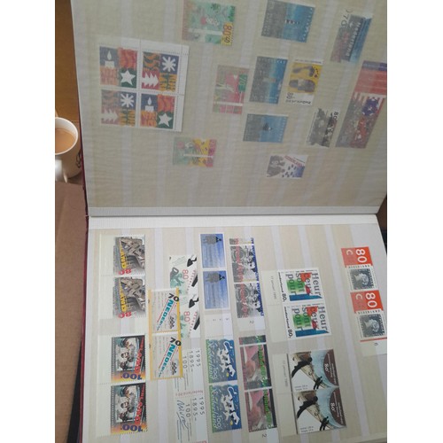 23 - 3 x stock books with a large accumulation of stamps of the Netherlands, a few used but mainly unmoun... 