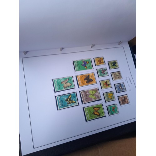 24 - Stamps of British Africa, 11 clean folders with printed pages for various countries either empty or ... 