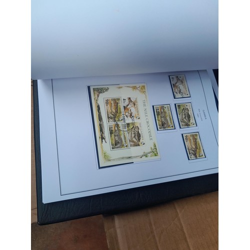 24 - Stamps of British Africa, 11 clean folders with printed pages for various countries either empty or ... 