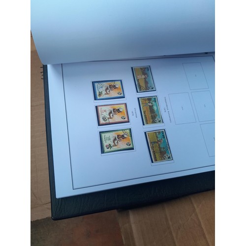 24 - Stamps of British Africa, 11 clean folders with printed pages for various countries either empty or ... 