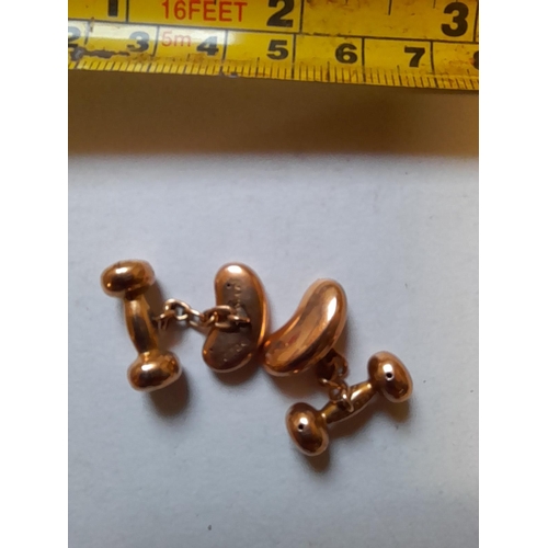 31 - Pair of 9 ct rose gold bean shape cufflinks 3.6 g