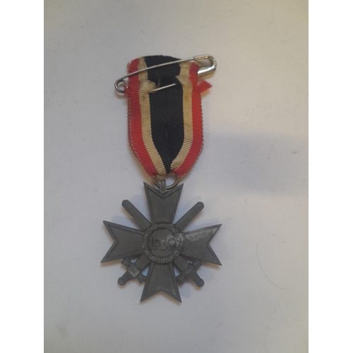 74 - World War II German Merit Cross 1939 with associated ribbon