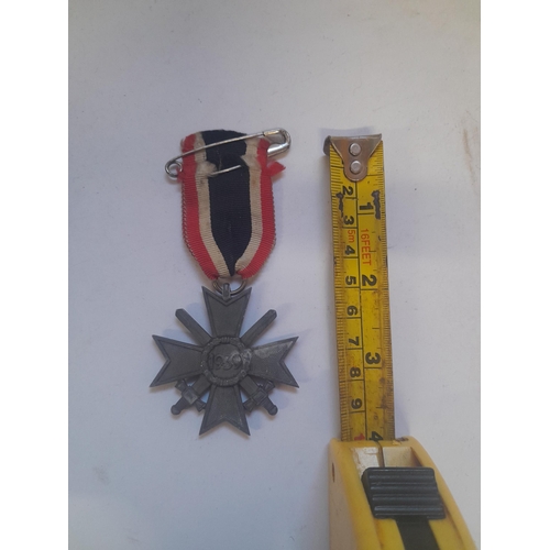 74 - World War II German Merit Cross 1939 with associated ribbon