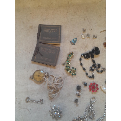 85 - Costume jewellery, milometer etc