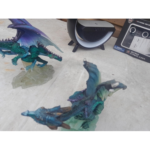 101 - Damaged Enchantica and other resin figures, books etc.