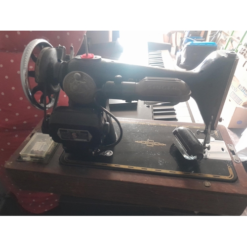 108 - 19th century rocking chair , copper warming pan and cast iron shovel, Singer sewing machine