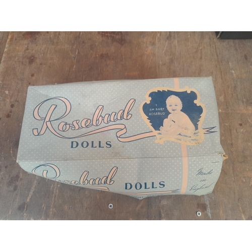 112 - Vintage Rosebud doll in box of issue, Girl Guide badges and memorabilia, postcards, travel clock etc... 