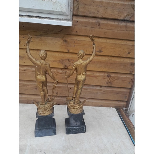 142 - Pair of early 20th century painted spelter figures depicting Commerce and Industry