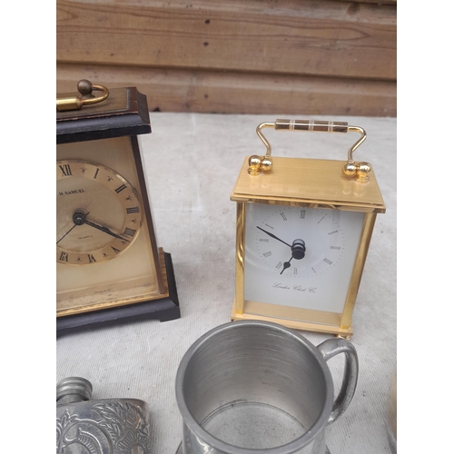 146 - Collection of Quartz carriage clocks, stilton scoop, hip flask, plated ware