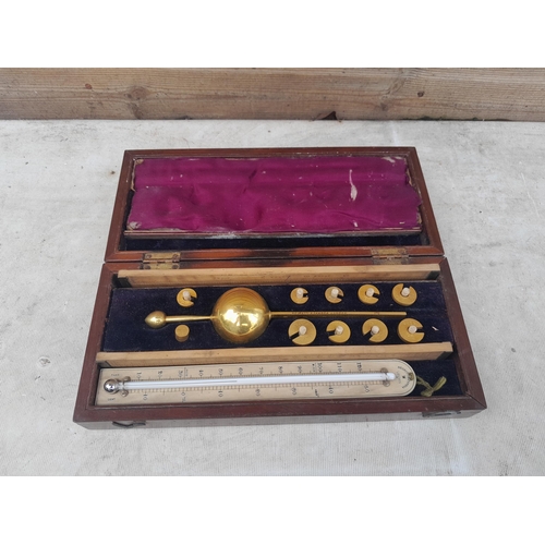 152 - Antique Negretti and Zambra hydrometer in inlaid mahogany box of issue & test tube by same maker