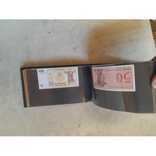 185 - Approx 63 Banknotes of the World in a folder, some uncirc.