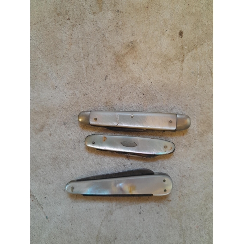 201 - 3 x early 20th century  mother of pearl handled folding penknives : 1 x silver blade & 2 x steel one... 