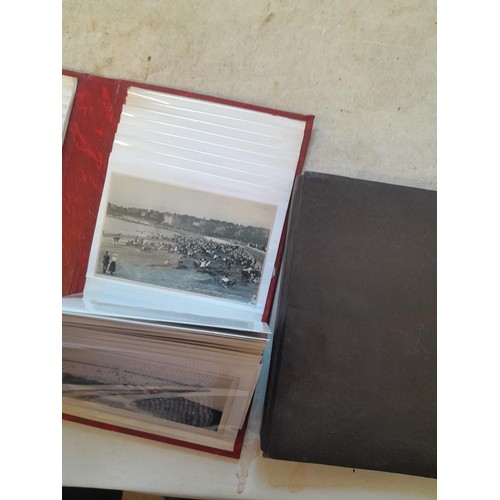 204 - Postcards : early - mid coloured and black and white postcards relating to Torquay & sparsely filled... 