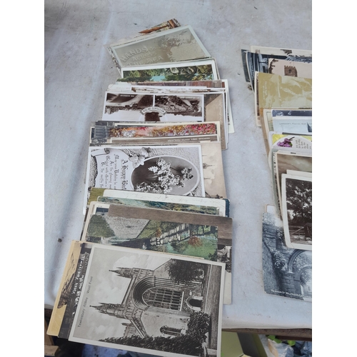 209 - Large shoebox of early - mid 20th century postcards, an interesting multithematic collection