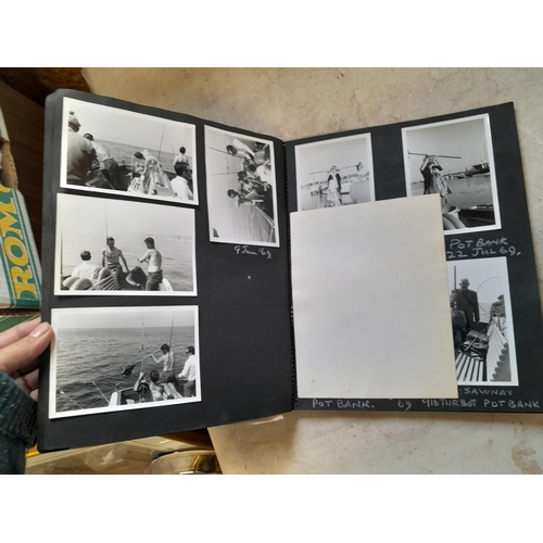 215 - 2 x scrap books of black and white photographs, one album fishing related the other family snaps