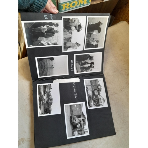 215 - 2 x scrap books of black and white photographs, one album fishing related the other family snaps