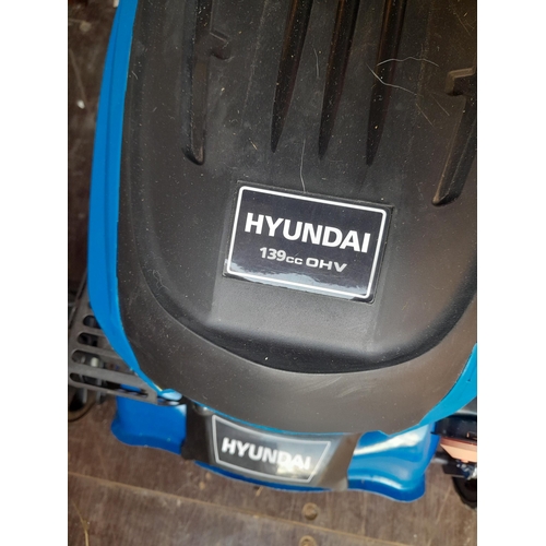 392 - Hyundai  139cc  OHV Petrol Lawnmower, with key start, barely used