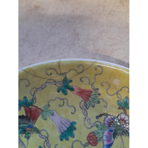 402 - Antique Chinese Famille Rose porcelain dish in Imperial yellow colours, note early restoration