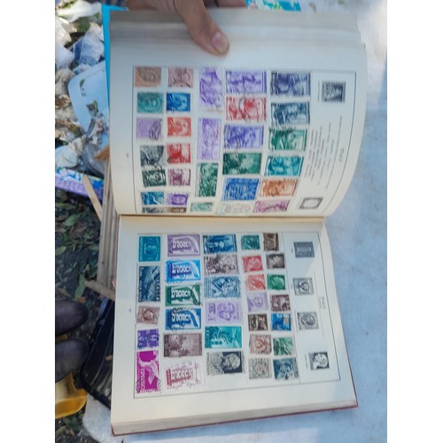 419 - 2 x albums of mint and used stamps of the world