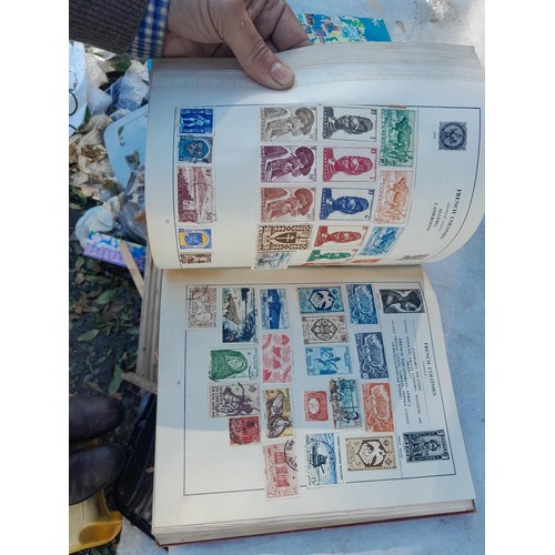 419 - 2 x albums of mint and used stamps of the world