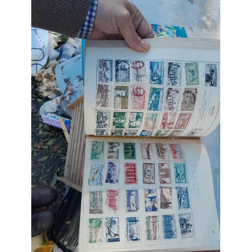 419 - 2 x albums of mint and used stamps of the world