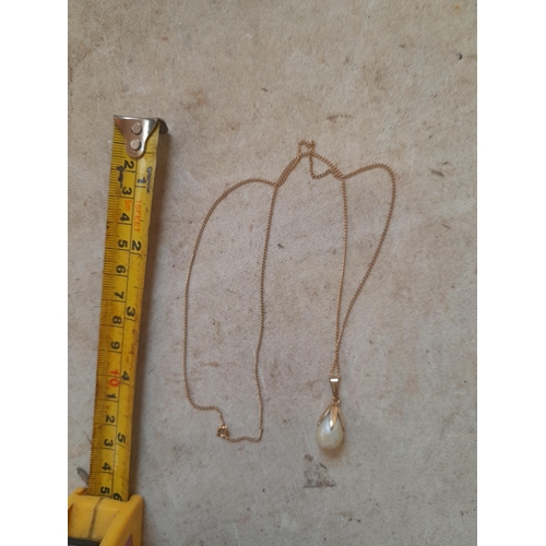 452 - Pair of earrings & simulated pearl set in rolled gold on a 9 ct unmarked gold necklace