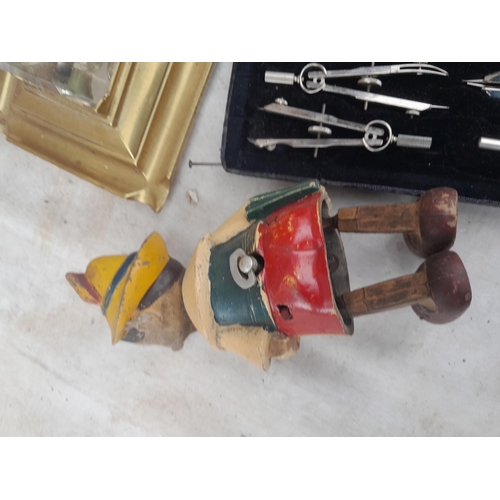 486 - Vintage rubber Pinocchio clockwork toy (rubber now solid), copper coaching horn, trade cards in albu... 