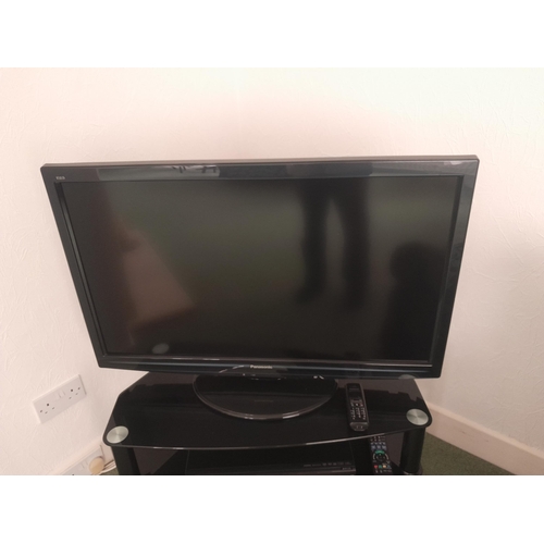 1 - Panasonic flat screen television with DVD player & VHS video recorder and one other monitor